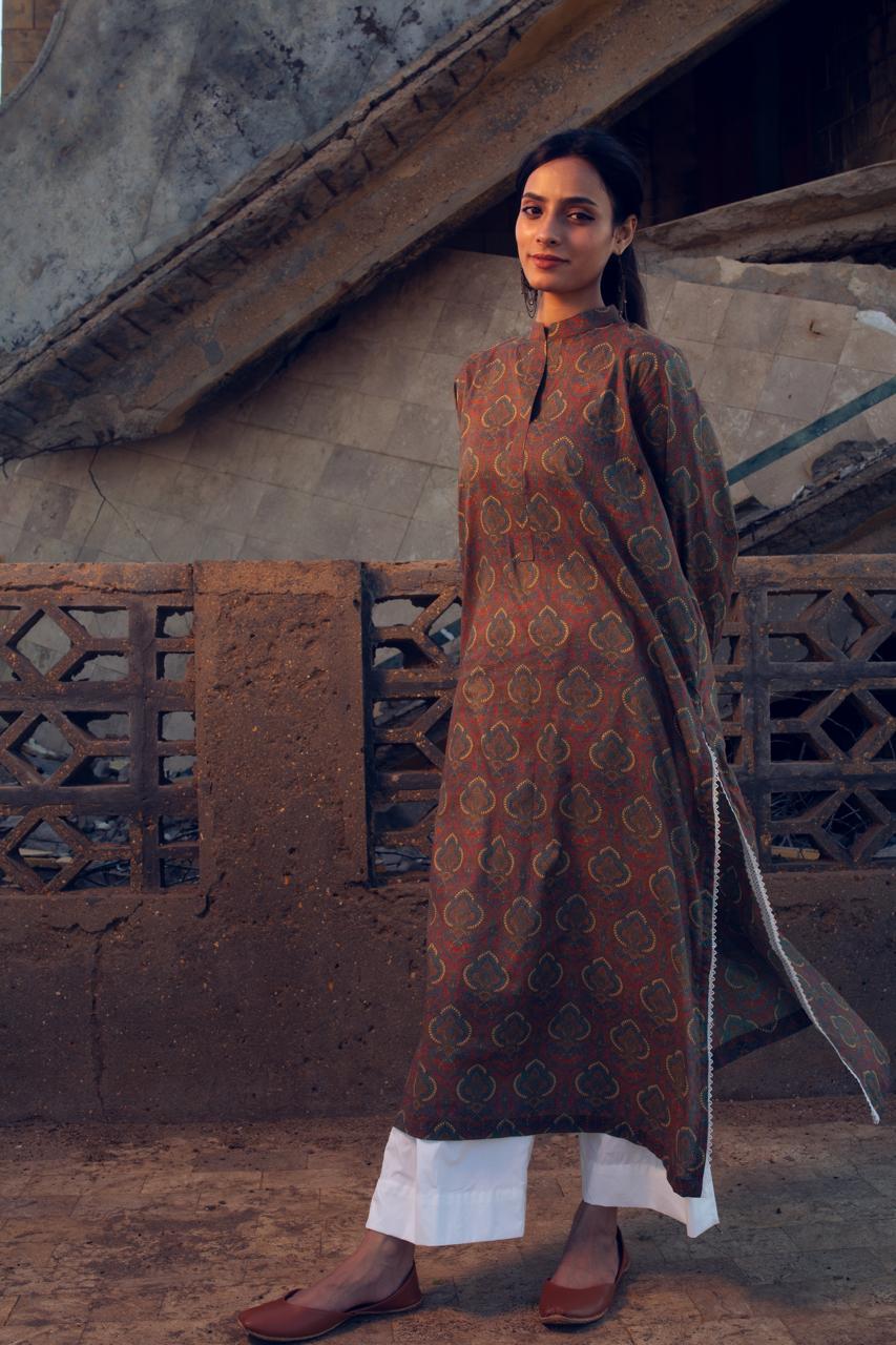 Brown printed kurta with plain white trouser in lawn